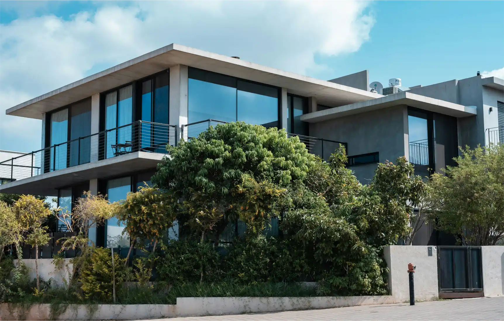 Luxury coastal stone and glass villa by Westgate Real Estate